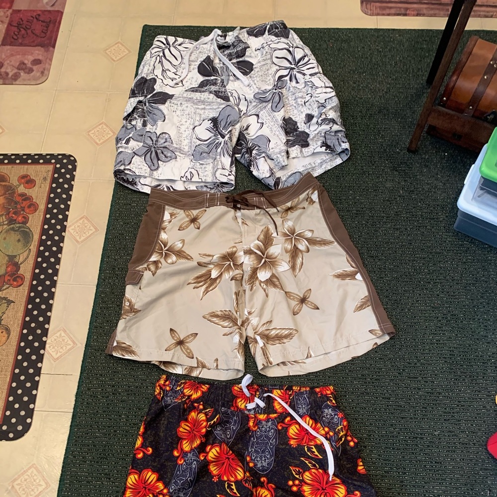 ATTENTION! MENS SWIM TRUNKS 16 EACH ALL LARGE.